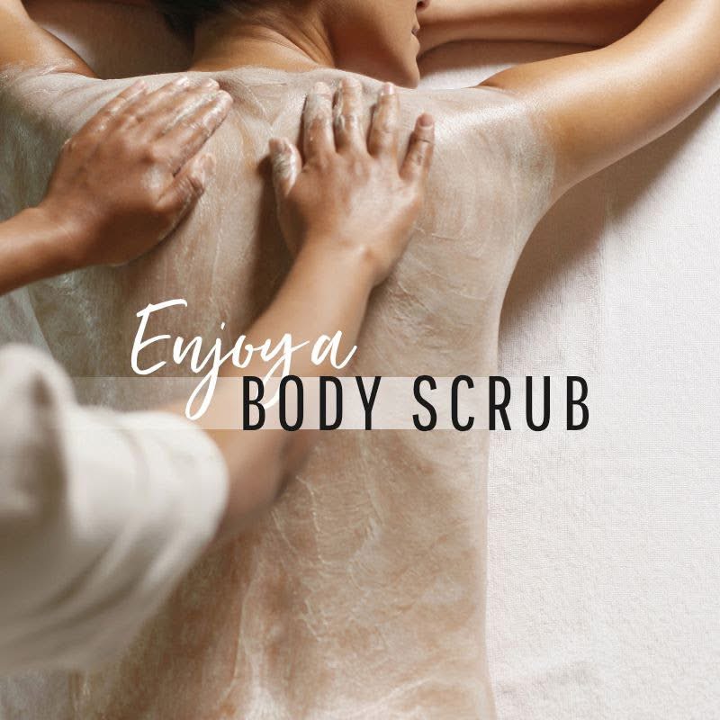 Therapist applying a body scrub